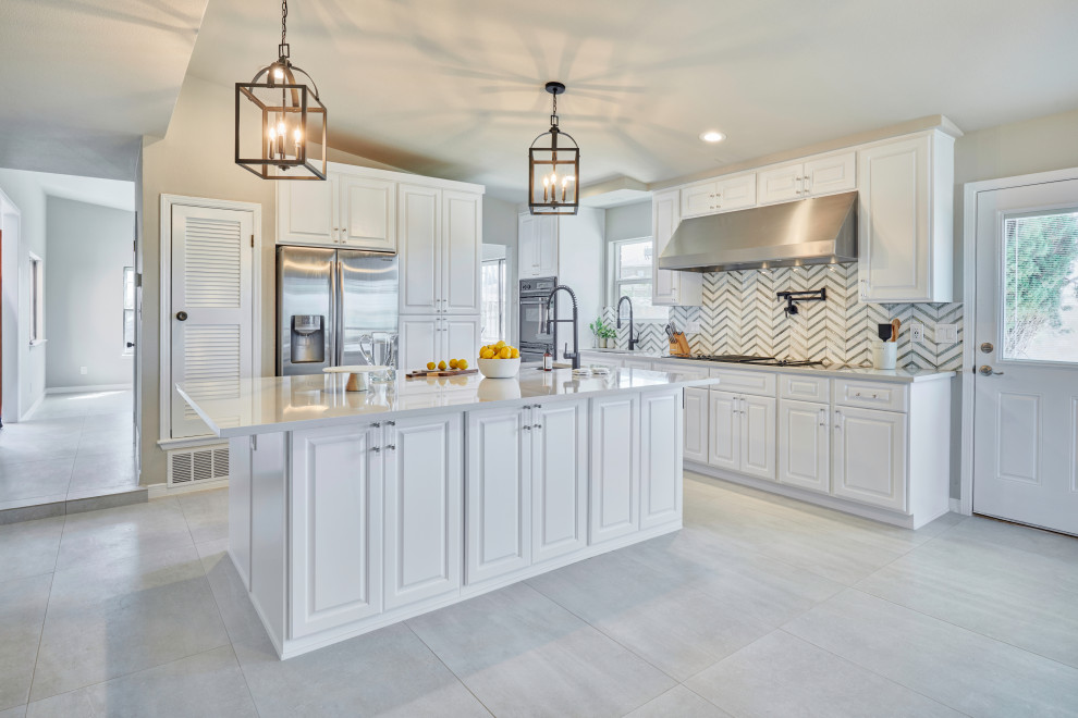 Small transitional l-shaped porcelain tile and gray floor eat-in kitchen photo with an undermount sink, beaded inset cabinets, white cabinets, quartzite countertops, multicolored backsplash, glass sheet backsplash, black appliances, a peninsula and white countertops
