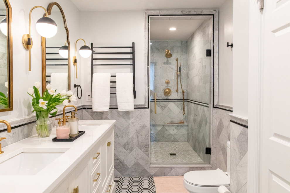 Traditional master bathroom in Baltimore with beaded inset cabinets, white cabinets, an alcove shower, marble, marble floors, a hinged shower door, white benchtops, a shower seat, a double vanity, a freestanding vanity and decorative wall panelling.