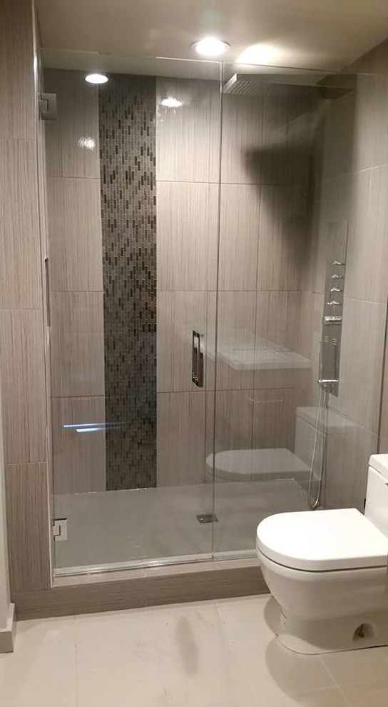 Inspiration for a transitional 3/4 bathroom in Austin with an alcove shower, gray tile, porcelain tile, porcelain floors, beige floor and a hinged shower door.