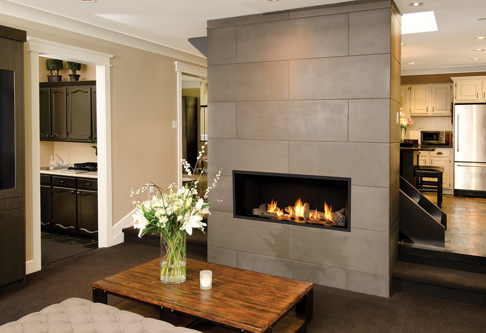 Photo of a mid-sized modern formal open concept living room in Portland with beige walls, carpet, a standard fireplace, a concrete fireplace surround and no tv.