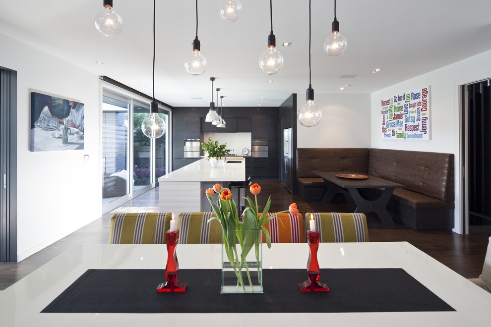 This is an example of a contemporary open plan dining in Auckland.