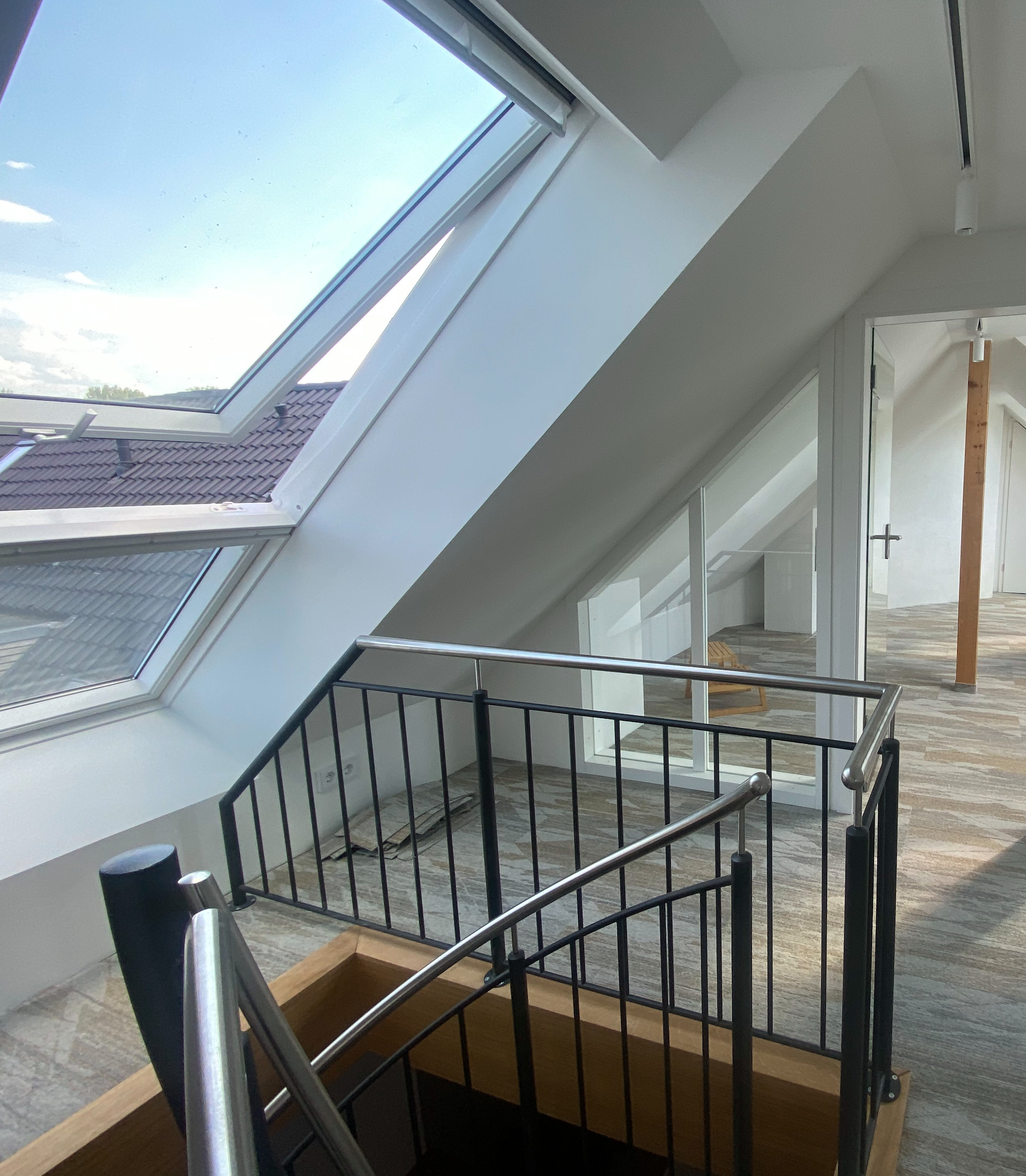 Dachumbau mit Wendeltreppe