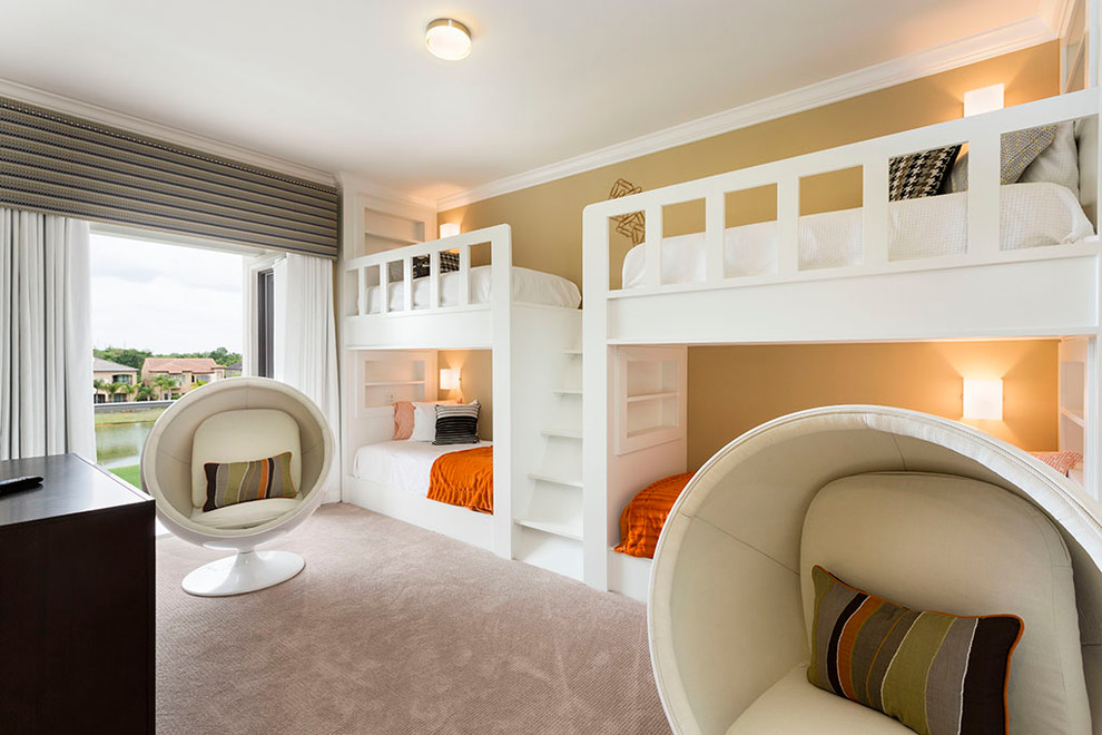 Inspiration for a mid-sized transitional gender-neutral kids' room in Orlando with beige walls, carpet and beige floor.
