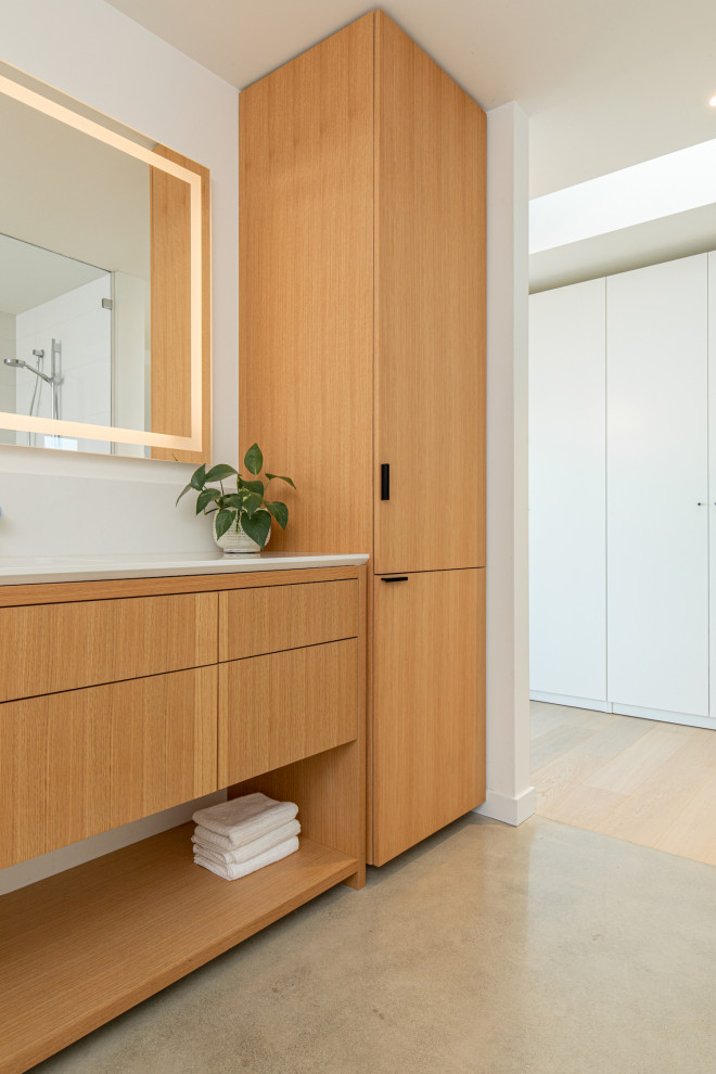 Inspiration for a mid-sized contemporary bathroom in Vancouver with flat-panel cabinets, a freestanding tub, an open shower, white tile, white walls, porcelain floors, an undermount sink, engineered quartz benchtops, grey floor, an open shower, white benchtops, a single vanity and a floating vanity.