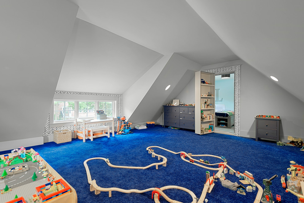 Design ideas for a large transitional kids' playroom for kids 4-10 years old and boys in Chicago with carpet, vaulted, white walls and blue floor.