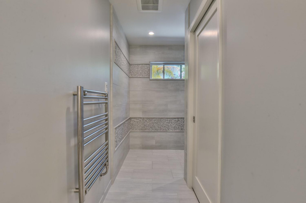 Mid-sized contemporary master bathroom in San Francisco with shaker cabinets, dark wood cabinets, a corner shower, a one-piece toilet, gray tile, glass sheet wall, grey walls, cement tiles, an undermount sink, quartzite benchtops, grey floor, an open shower and orange benchtops.