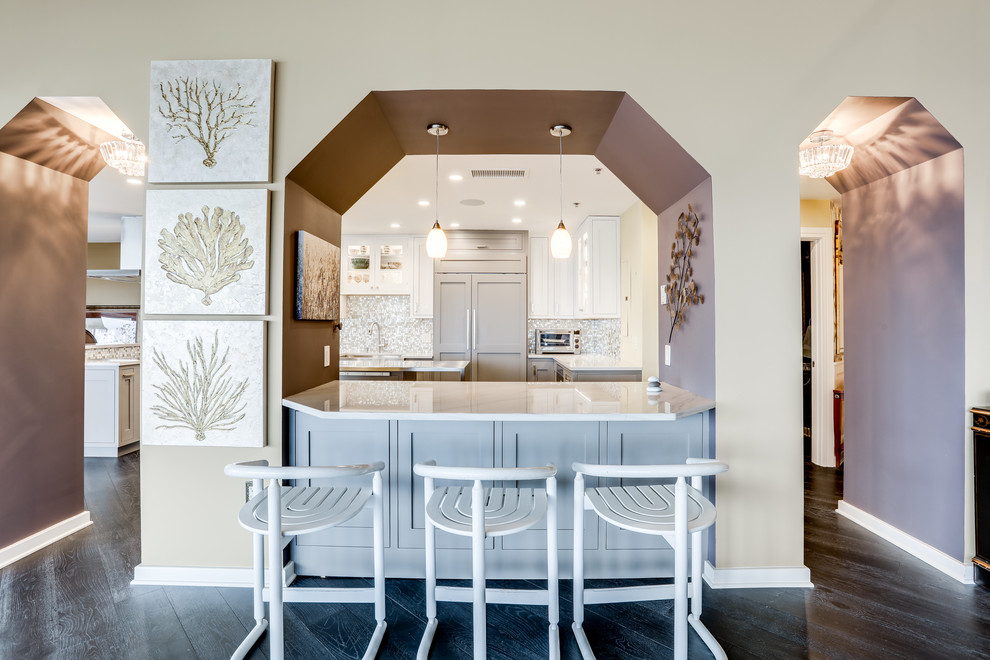 Inspiration for a large transitional enclosed kitchen remodel in Baltimore with a farmhouse sink, mosaic tile backsplash, stainless steel appliances and an island
