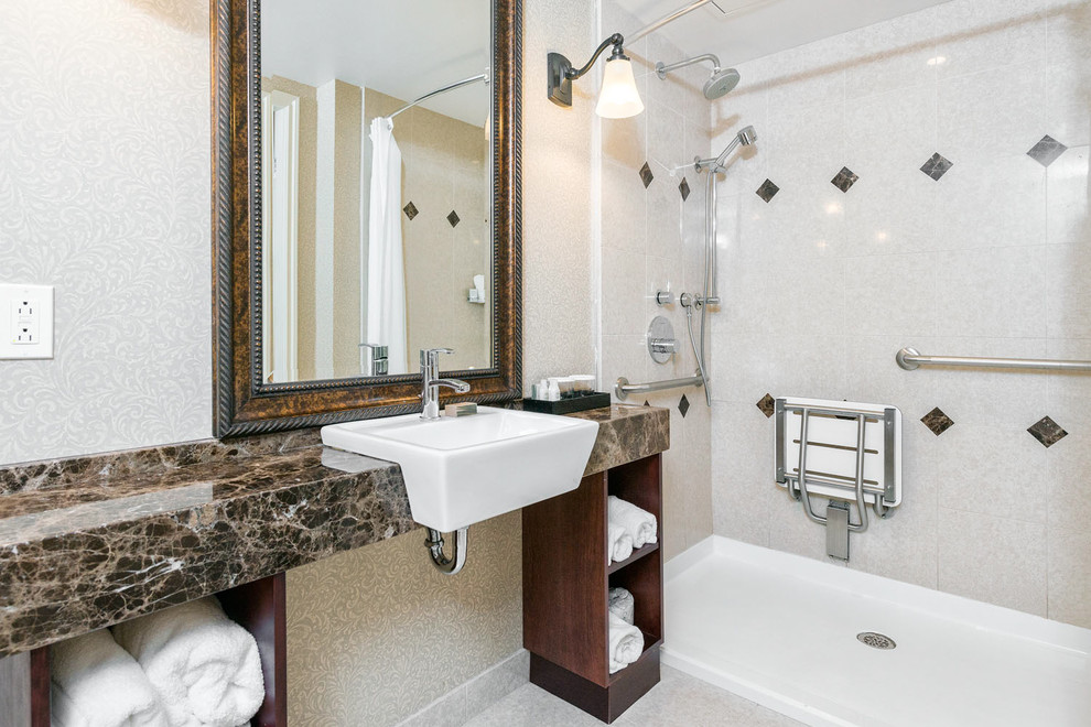 This is an example of a traditional bathroom in Vancouver with an open shower and an open shower.