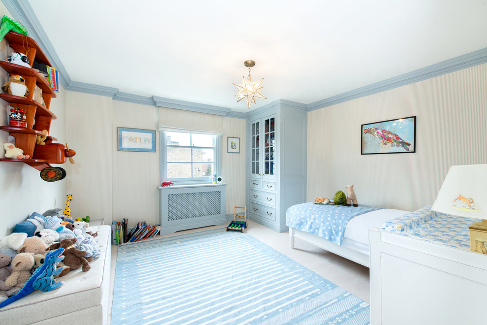 Design ideas for a traditional kids' room for kids 4-10 years old and boys in London with beige walls and carpet.