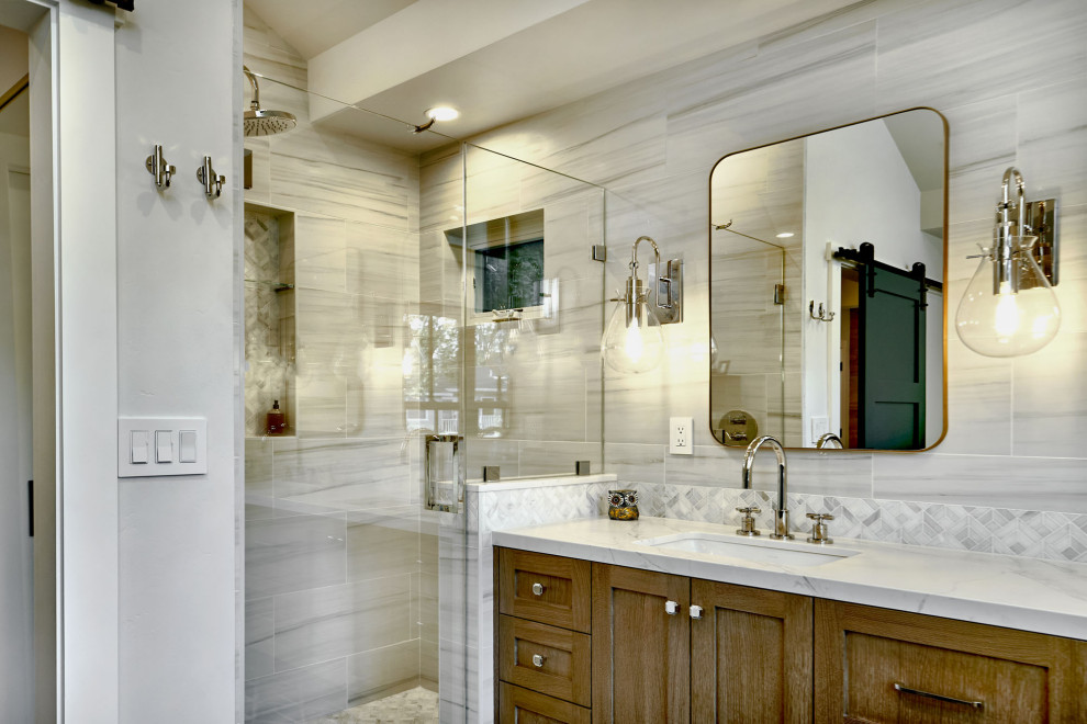 Inspiration for a mid-sized contemporary master bathroom in San Francisco with shaker cabinets, distressed cabinets, an alcove shower, a two-piece toilet, white tile, porcelain tile, white walls, light hardwood floors, an undermount sink, engineered quartz benchtops, blue floor, a hinged shower door, white benchtops, a double vanity, a floating vanity and vaulted.