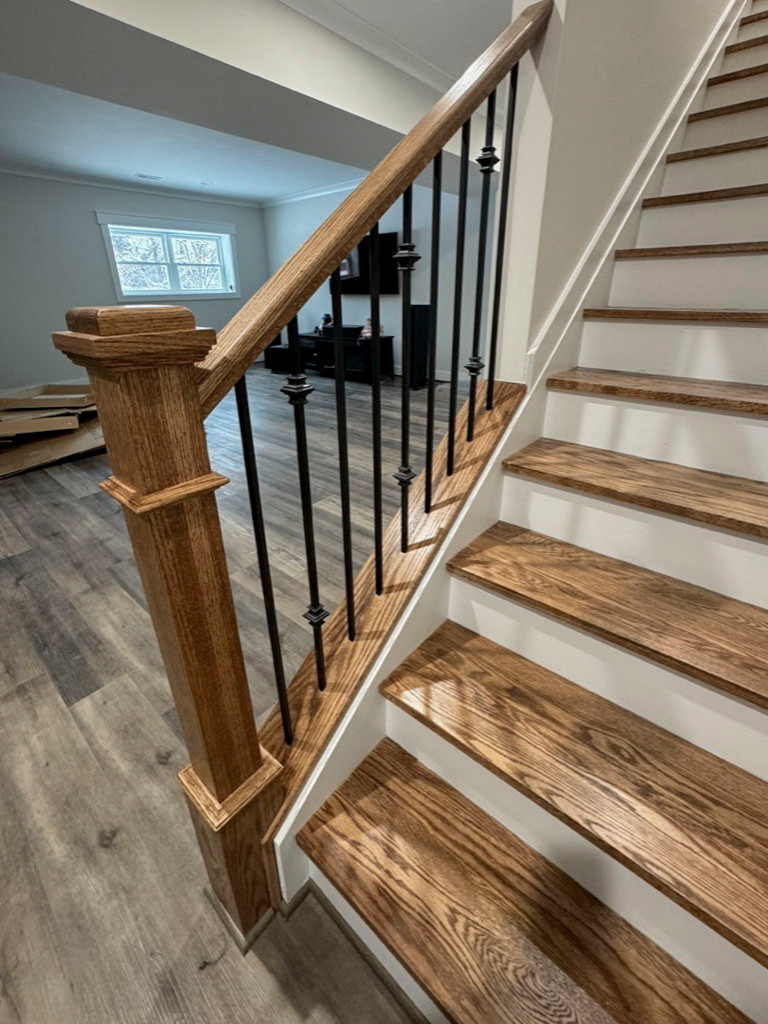 117_Distinct Oak Staircase with Iron Balusters & Oak Rail Profile, Chantilly VA