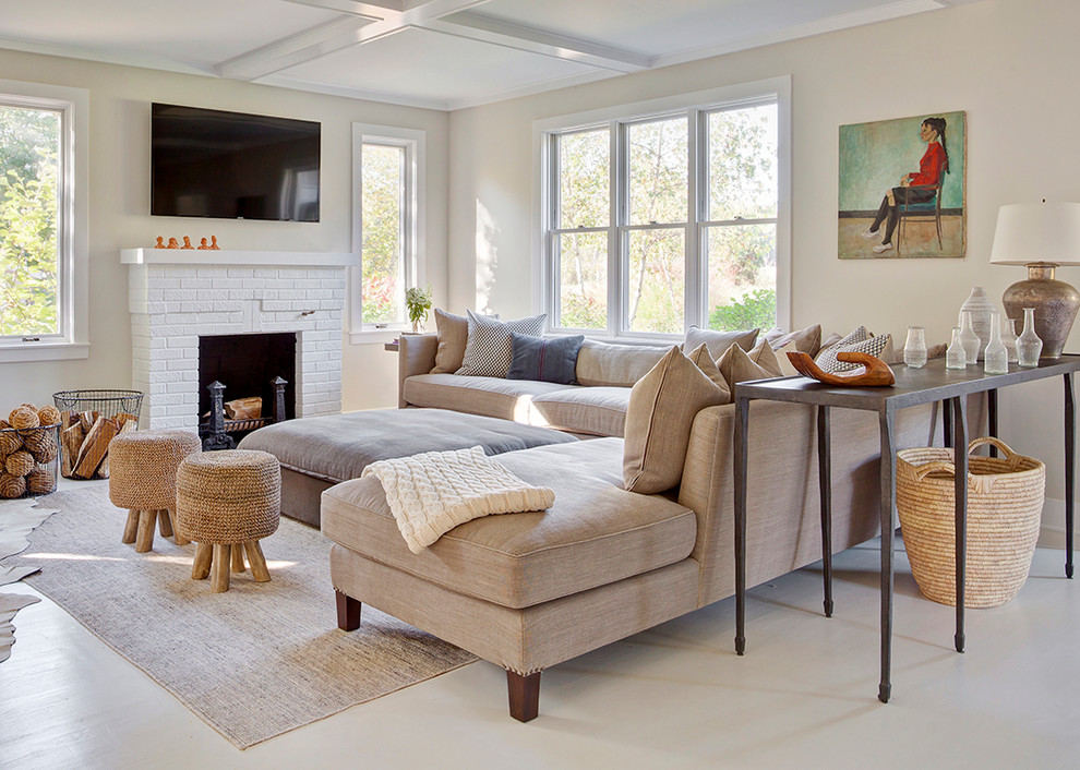 Inspiration for a mid-sized traditional formal enclosed living room in Chicago with yellow walls, vinyl floors, a standard fireplace, a brick fireplace surround and a wall-mounted tv.