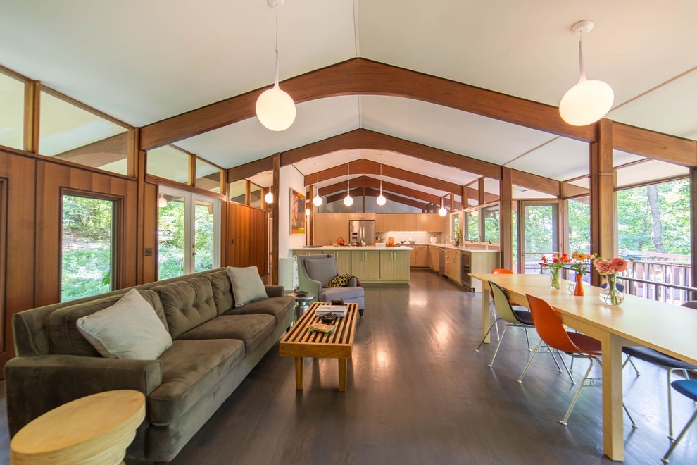Inspiration for a mid-century modern open concept dark wood floor and brown floor living room remodel with white walls