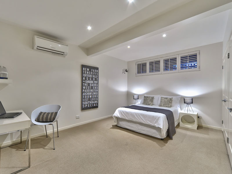 Photo of a contemporary bedroom in Brisbane.