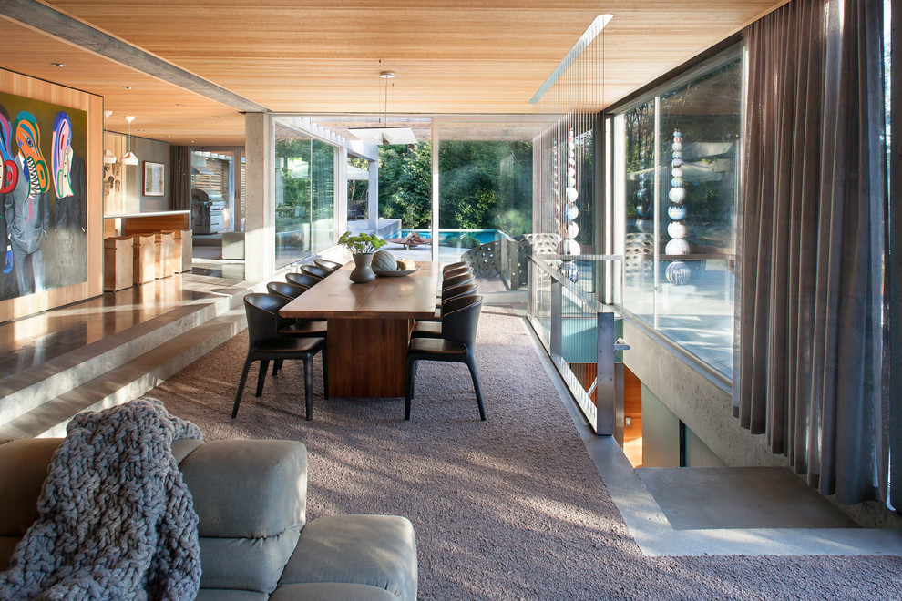 Inspiration for an expansive modern open concept living room in Vancouver with carpet and no tv.