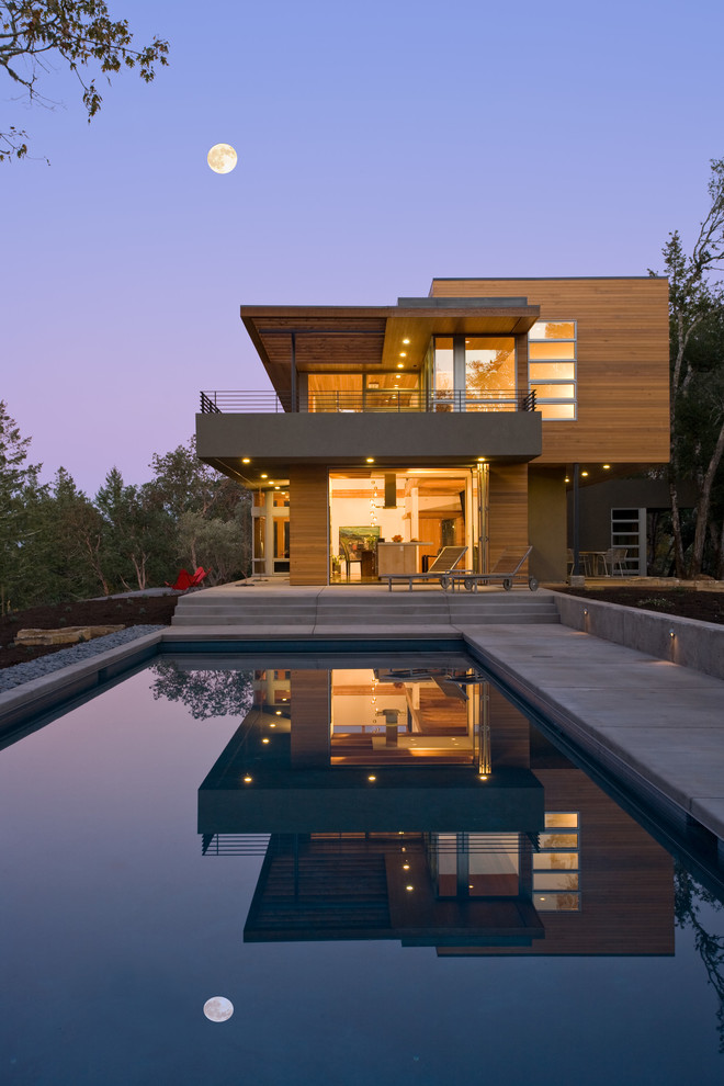 Mid-sized modern two-storey exterior in San Francisco with wood siding and a flat roof.