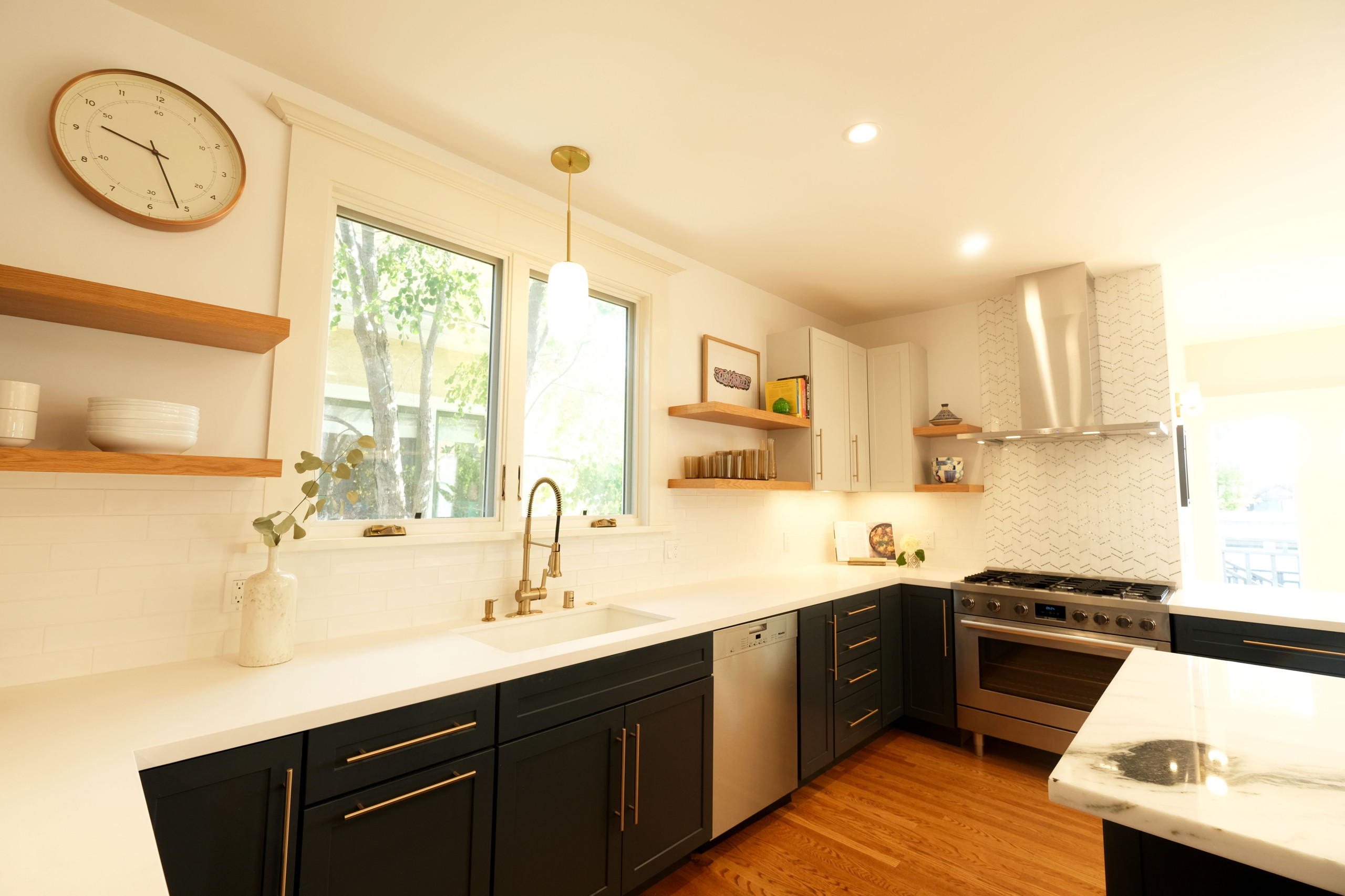 Contemporary Navy Kitchen with Brass Accents