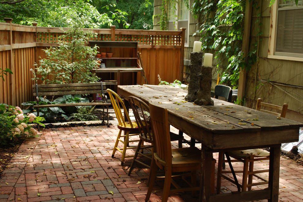 Rustic Hillside Courtyard Traditional Patio Minneapolis by
