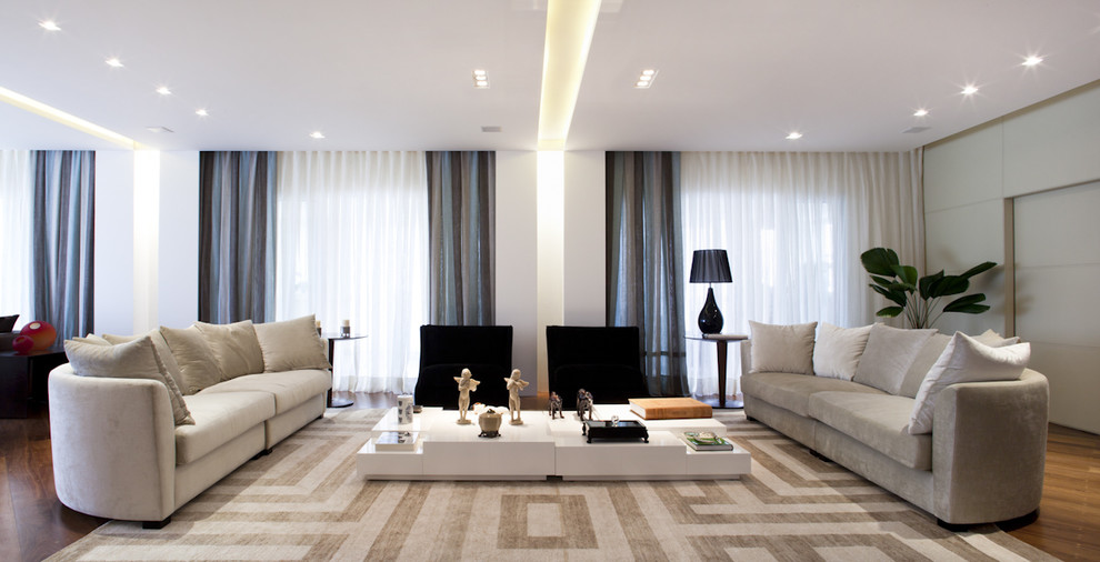 Living room - contemporary living room idea in Other with white walls