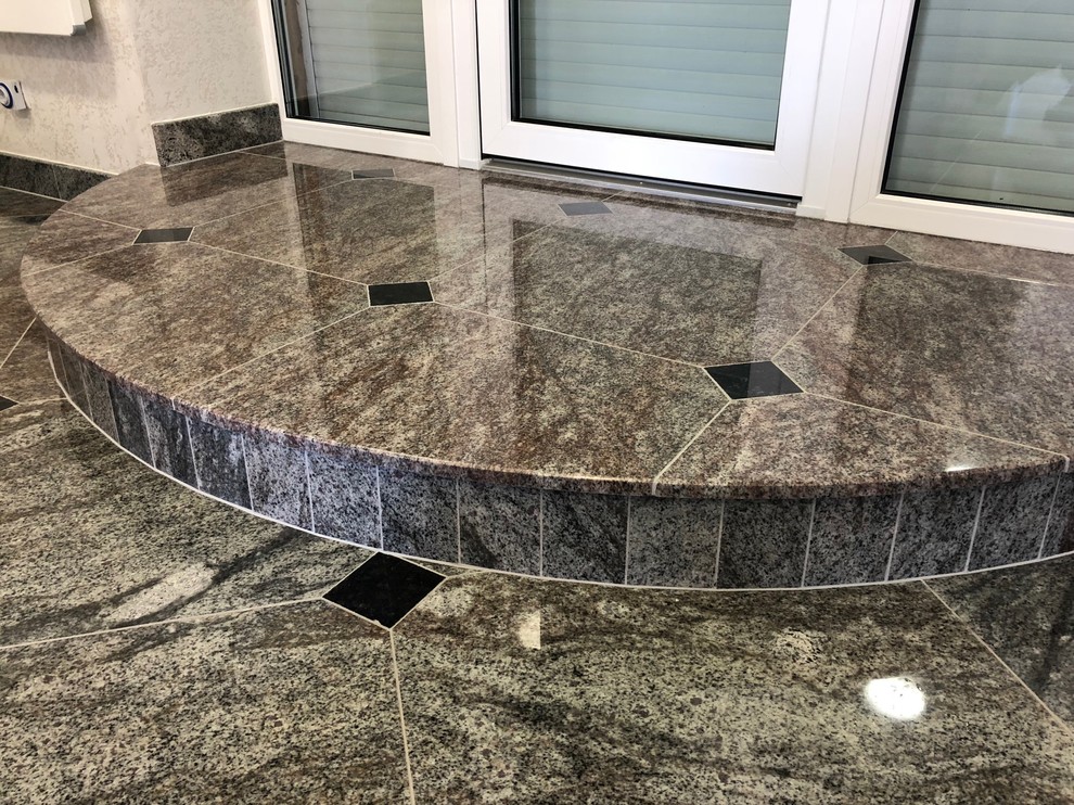 Офис наших партнеров гранит Garnet Grey и лабрадорит Galactic Blue