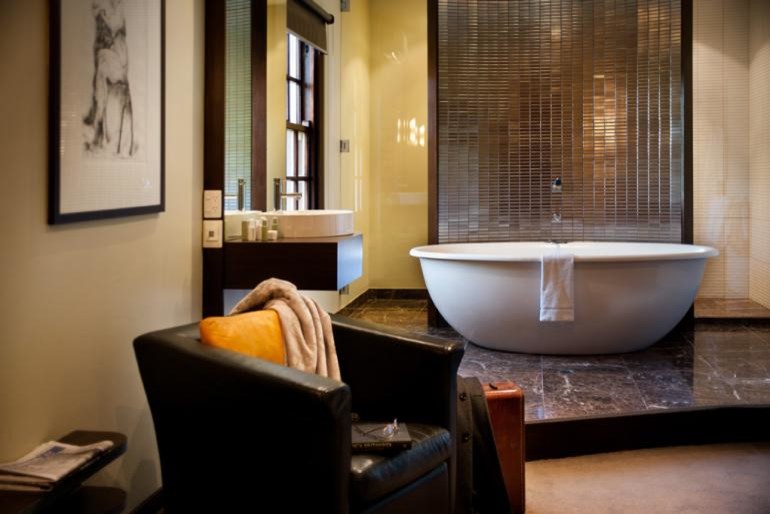 Inspiration for a contemporary bathroom in Melbourne with a freestanding tub.