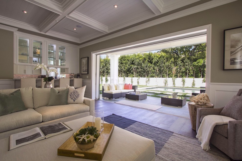 Living room - contemporary living room idea in Los Angeles with beige walls