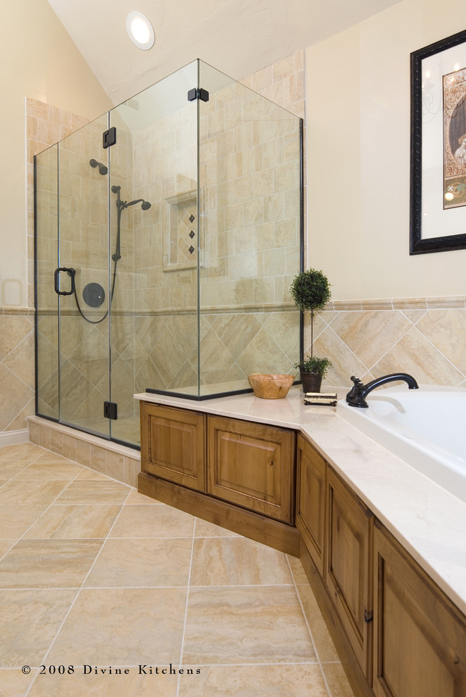 Photo of a large traditional master bathroom in Boston with a trough sink, beaded inset cabinets, medium wood cabinets, a drop-in tub, a corner shower, beige tile and beige walls.