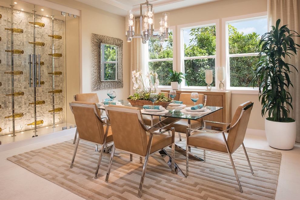 This is an example of a mid-sized contemporary dining room in San Diego with beige walls.