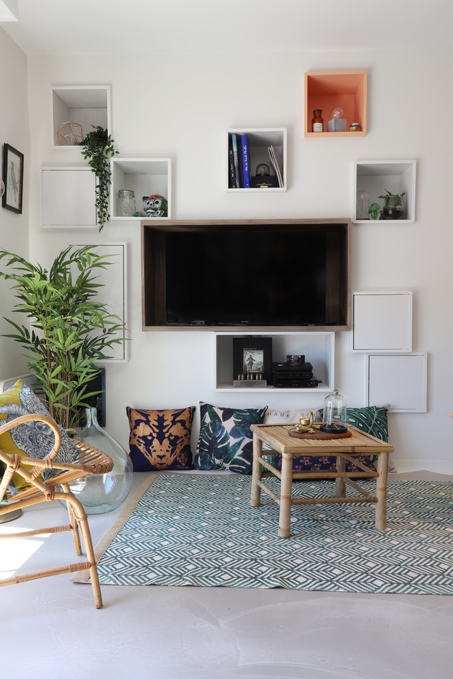 Design ideas for a tropical living room in Le Havre.