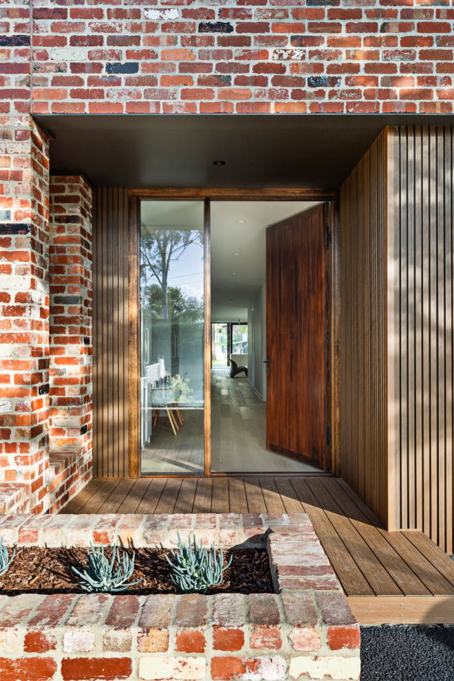 Inspiration for a contemporary entryway in Melbourne.