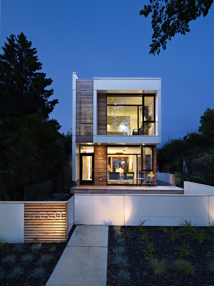 Modern exterior in Edmonton with wood siding.