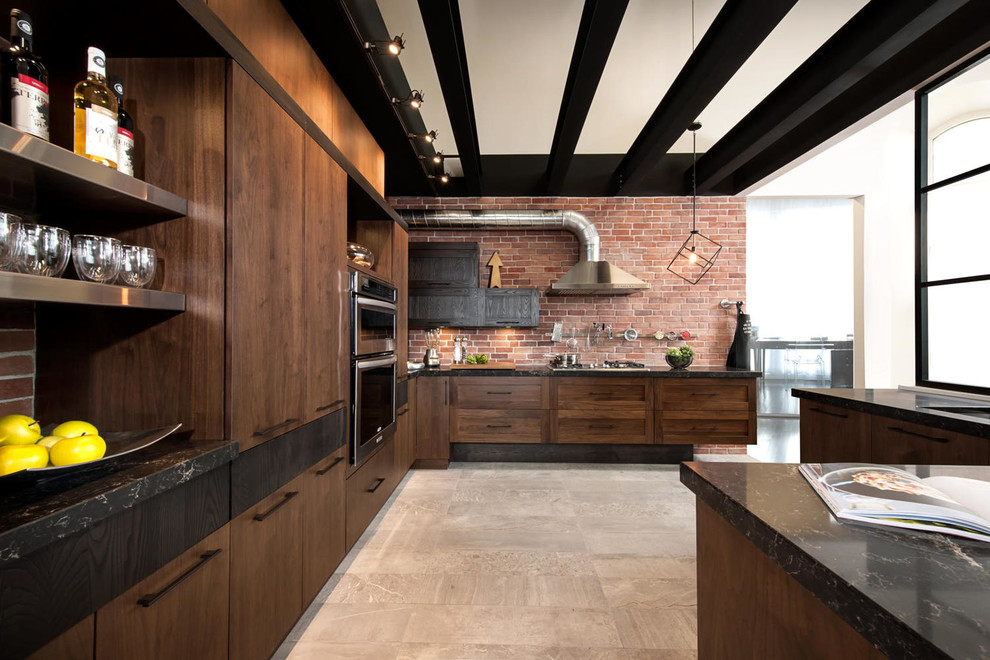 Inspiration for an expansive industrial kitchen in Montreal with a double-bowl sink, quartzite benchtops, stainless steel appliances and with island.