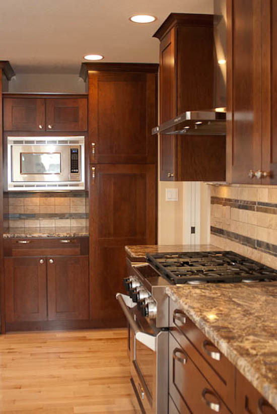 Example of a transitional kitchen design in Denver