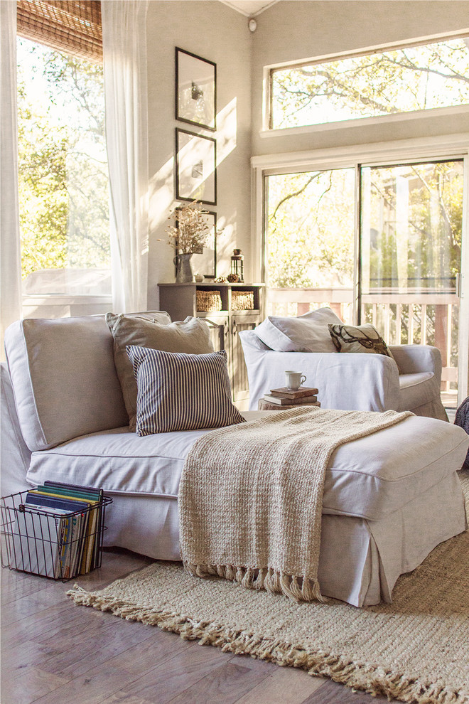Living room - large farmhouse open concept light wood floor and gray floor living room idea in Tampa with gray walls, a standard fireplace and a stone fireplace
