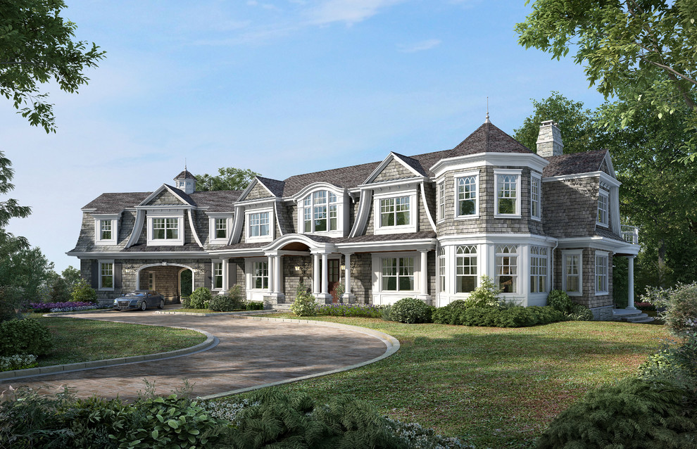 Design ideas for a large beach style two-storey grey exterior in New York with wood siding and a hip roof.