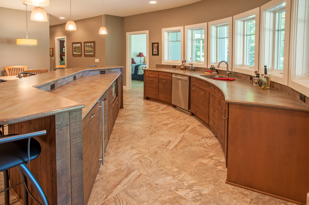 Kitchen - mid-sized craftsman u-shaped ceramic tile and beige floor kitchen idea with furniture-like cabinets, medium tone wood cabinets, concrete countertops, beige backsplash and an undermount sink