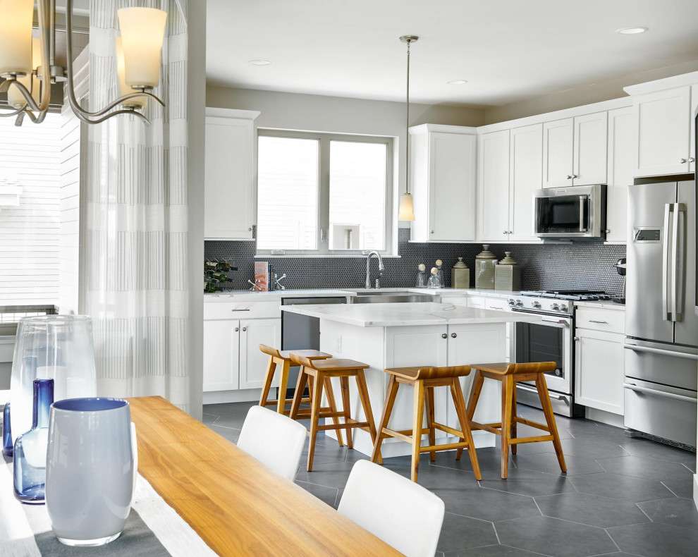 Example of a transitional kitchen design in Denver