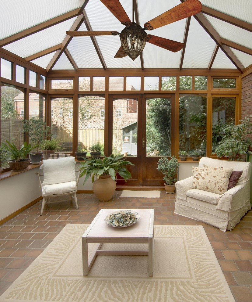 Mid-sized country sunroom in Houston with ceramic floors, no fireplace and a skylight.