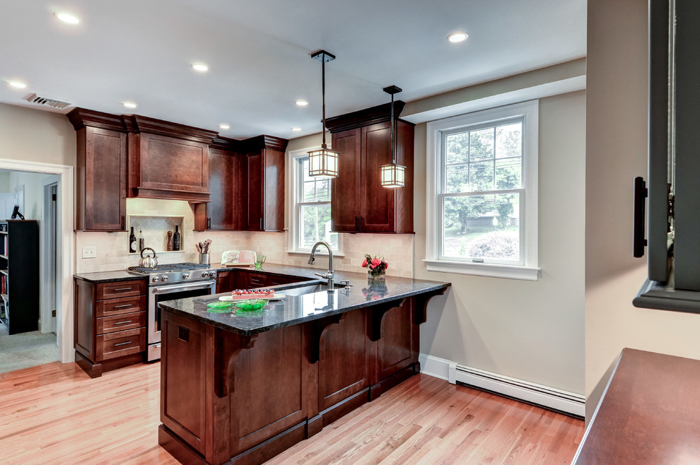 Peninsula island provides space for seating or serving Craftsman