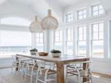 Beach Style Dining Room by Chango