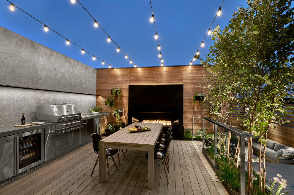 Inspiration for a small contemporary back terrace in Chicago with an outdoor kitchen and no cover.