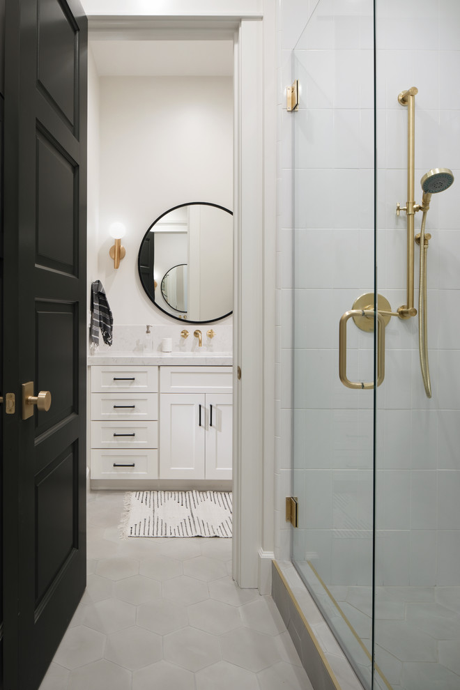 Design ideas for a mid-sized transitional kids bathroom in Phoenix with shaker cabinets, an open shower, a one-piece toilet, white tile, subway tile, white walls, ceramic floors, an undermount sink, engineered quartz benchtops, grey floor, a hinged shower door and white cabinets.