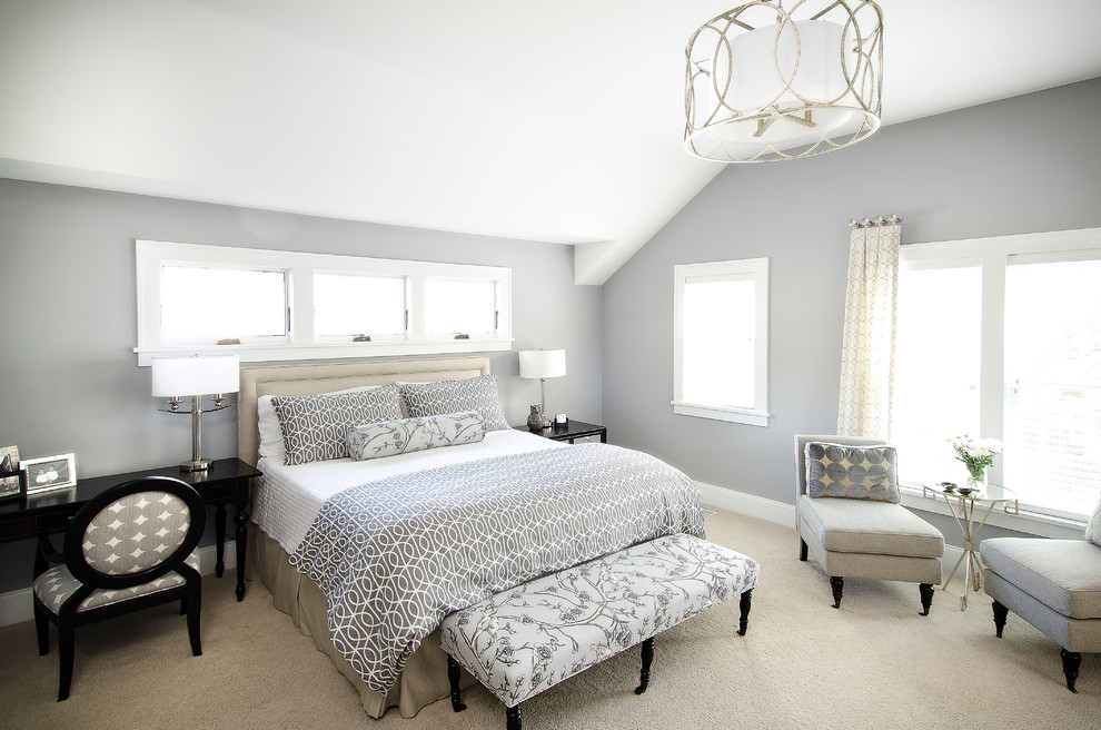 Inspiration for a mid-sized transitional master bedroom in Chicago with blue walls and carpet.