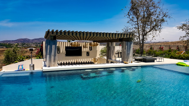Outdoor Entertainment and Massive Pool modern-pools