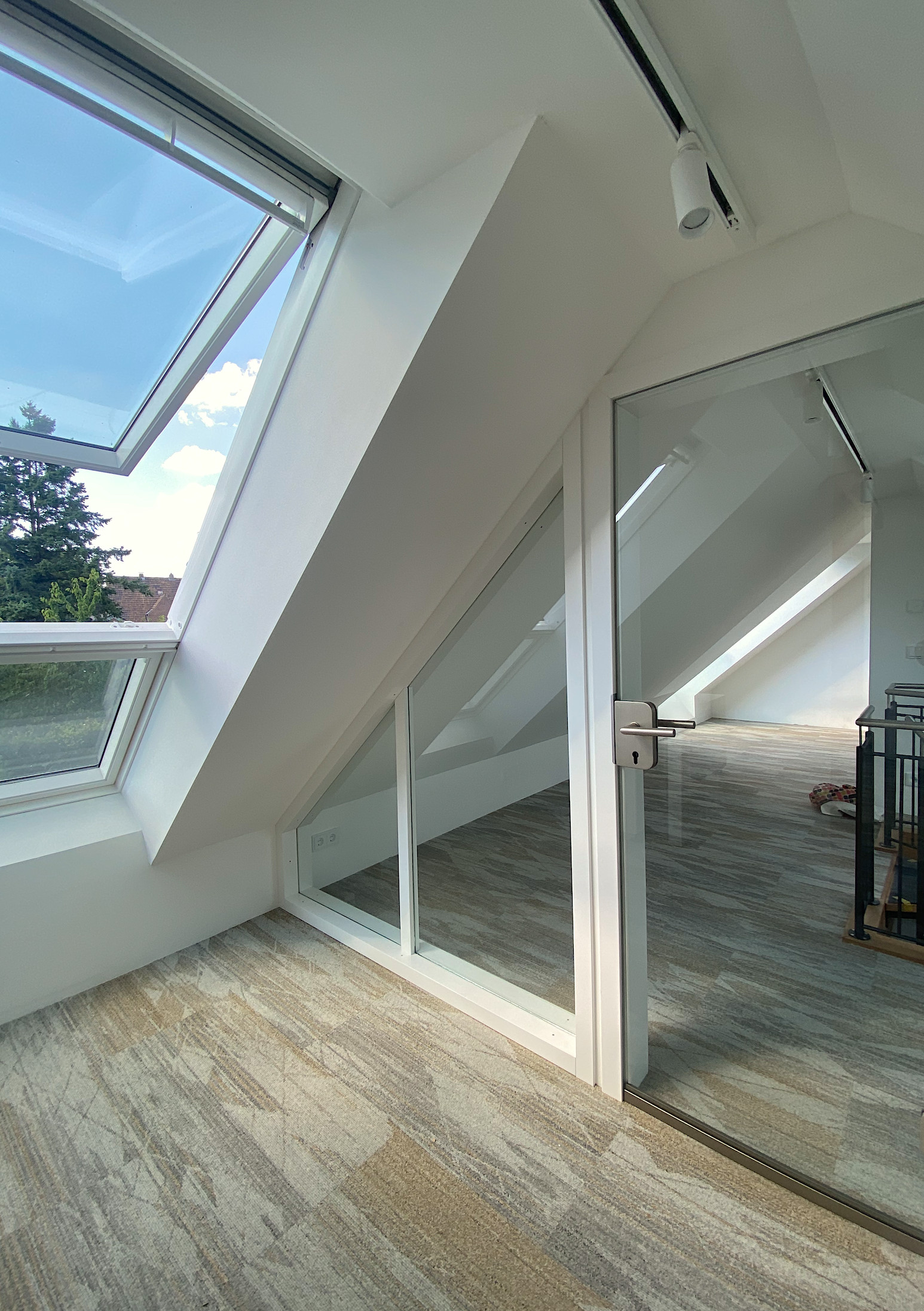 Dachumbau mit Wendeltreppe