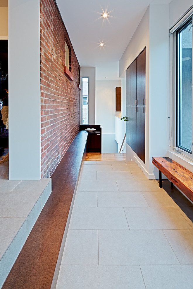 Contemporary hallway in Toronto with white walls.