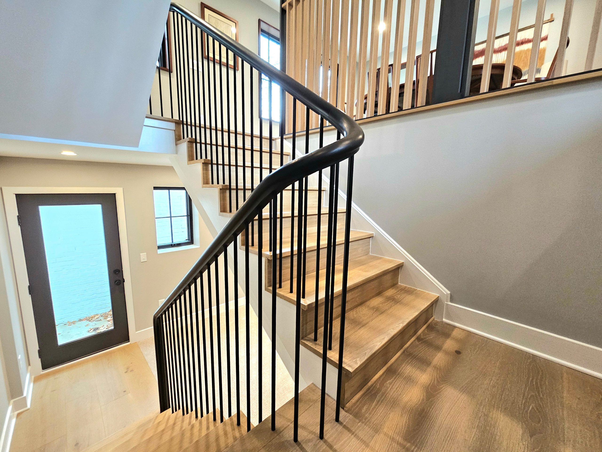 115_Stunning Continuous Rail System on 3 Story Floating Stairs; Arlington, VA 22