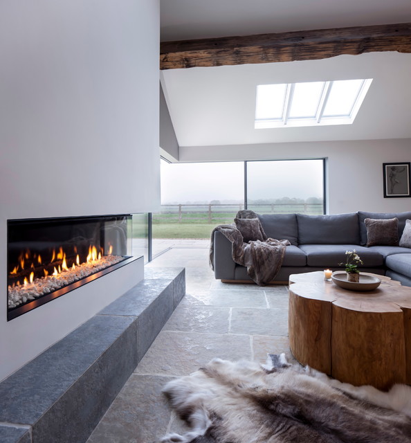 Barn Lounge with Log Stack contemporary-living-room
