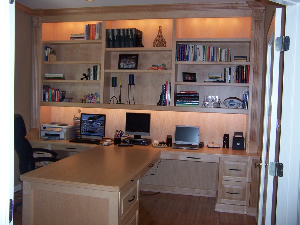 Photo of a mid-sized transitional home office in Newark with no fireplace and a built-in desk.