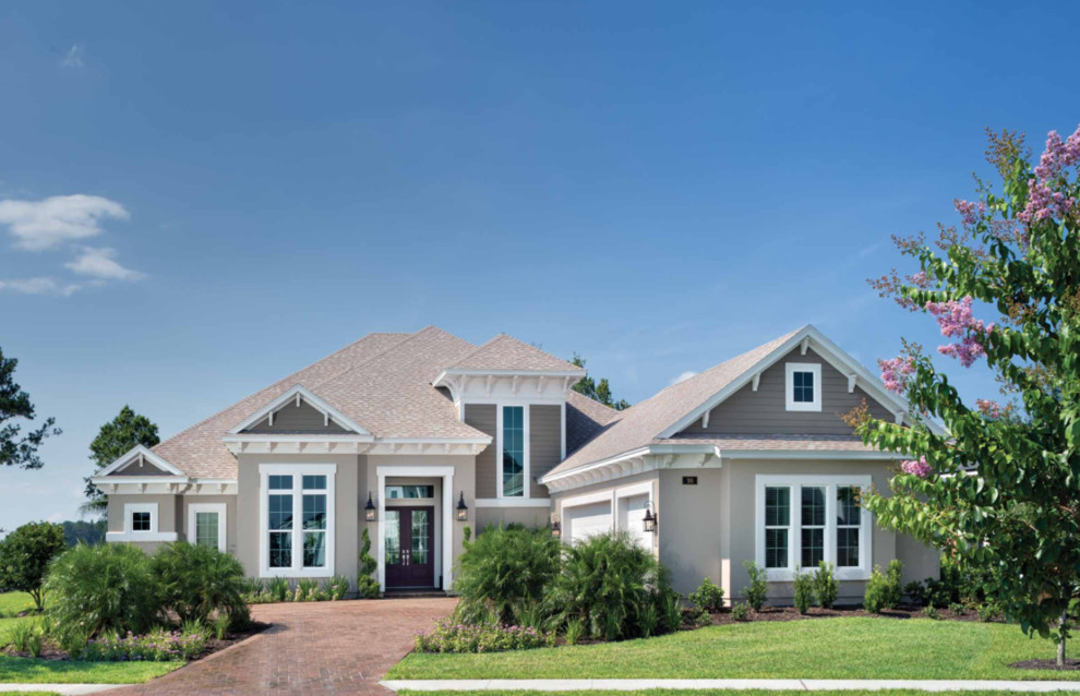 This is an example of a beach style home design in Jacksonville.